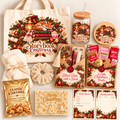 A Christmas-themed gift set arranged on a white background, including a cream tote bag, glass jar, round tin, envelope-style treat box, blind date with a book card, reading tracker, scrunchie, popcorn bag, and decorative cards. The designs feature red holiday wreaths, ornaments, pine branches, and a fox illustration, with titles such as 'A Storybook Christmas' and 'A Little Christmas Treats'.