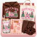 A Christmas-themed gift box set from Saint Nick's Christmas Tree Farm, containing a brown hoodie, a cream tote bag, a glass mason jar, a pink patterned pouch, a brown knit item, and a brown scrunchie, all arranged in a pink box with shredded paper filler.