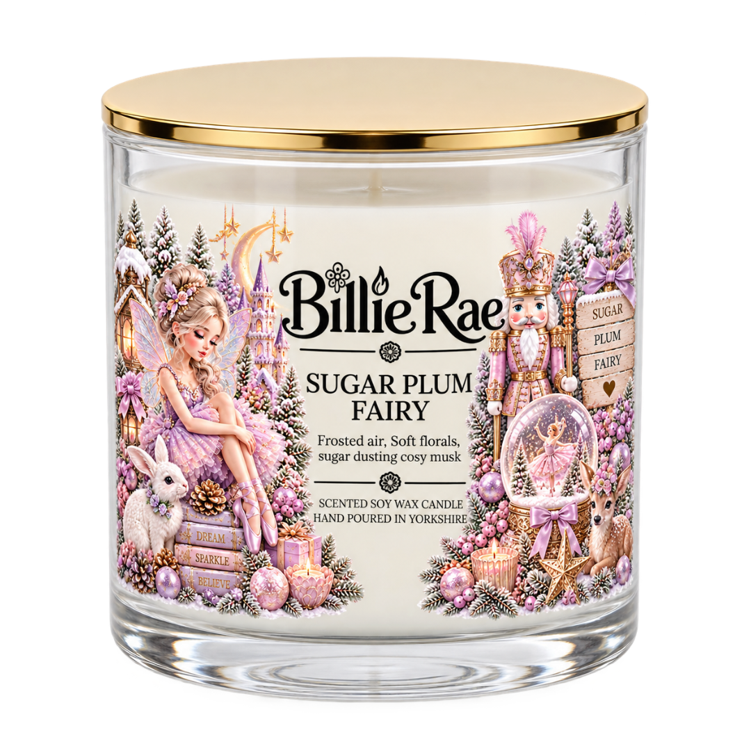 Sugar Plum Fairy 500g double wick Christmas glass candle by Billie Rae with gold lid and a soft sweet floral and gentle musk fragrance.