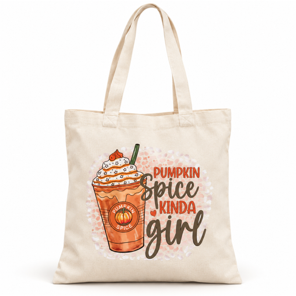A natural canvas tote bag with a 'Pumpkin Spice Kinda Girl' graphic featuring an orange pumpkin spice latte and text, shown on a clean white background.